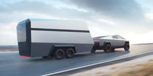 未來感十足的銀色 Tesla Cybertruck 在沙漠公路上拖著一個相配的拖車。 — Tesla GIF 壁紙