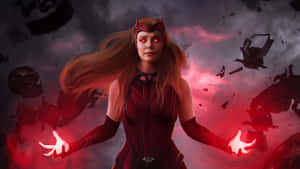 Wanda Maximoff 身穿紅色服裝，雙手發光，置身於飛舞的碎片和風暴雲中。 — 漫威超級英雄 壁紙