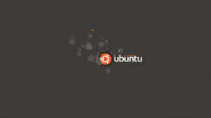 Ubuntu 標誌，橙色圓圈和白色文字在深灰色背景上，帶有發光粒子。