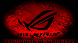 黑色 ROG Strix 標誌在帶有深色潑濺效果的紅色抽象背景上。