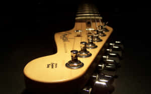 帶有鍍鉻調音栓的Fender Stratocaster結他琴頭的近距離特寫。