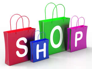 四個鮮豔的購物袋排列成SHOP字樣。