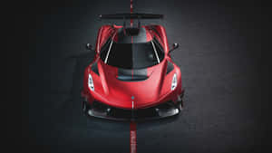 紅色 Koenigsegg 超級跑車從上方俯瞰，停在深色地板上。 — 7680x4320 壁紙