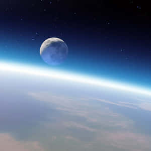 月亮在繁星點點的夜空下，位於地球彎曲地平線之上。 — 天空景觀 壁紙