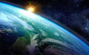 從太空看地球日出，背景有星星。 — 日出 壁紙