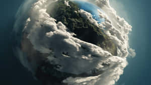 從太空觀看，一個被白色雲層包裹的綠色行星。 — 日落 壁紙