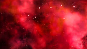 帶有發光恆星和旋轉宇宙塵埃的紅色宇宙星雲。
