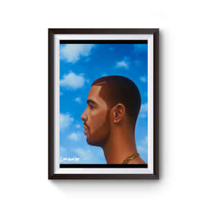 裝裱的Drake側面肖像，背景是藍天和白雲。