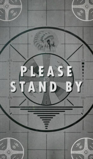 帶有「PLEASE STAND BY」文字和美洲原住民頭飾圖標的雷達屏幕。