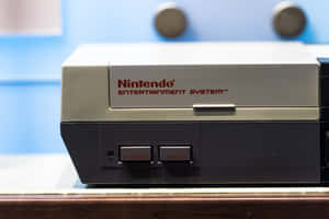 復古 Nintendo Entertainment System 遊戲主機，帶有電源和重置按鈕。 — MacBook Pro M4 壁紙