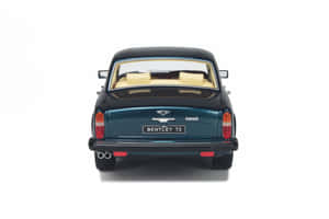 復古青綠色 Bentley T2 模型車，奶油色內飾，從後方觀看。 — MacBook Pro 14 壁紙