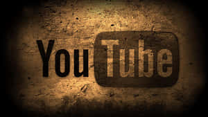 YouTube 標誌在粗糙紋理的牆壁上，帶有聚光燈和暗邊。 — 復古gif 壁紙
