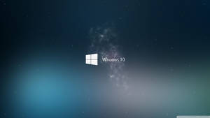 Windows 10 標誌在帶有星星和星雲的宇宙背景上。