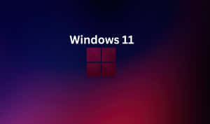 Windows 11 標誌在藍色到紅色的漸變背景上。