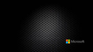 帶有Microsoft標誌的深色金屬六角形網格