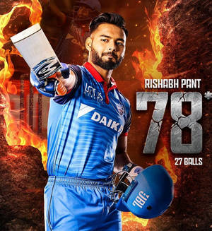藍色球衣的板球運動員Rishabh Pant手持球棒，背景火熱，得分78。