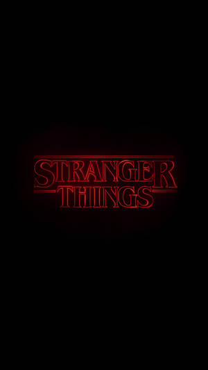 黑色背景上顯示 stranger things 的紅色霓虹文字