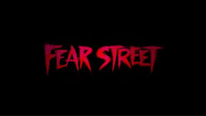黑色背景上發出紅光的恐怖標題文字，寫著 Fear Street。