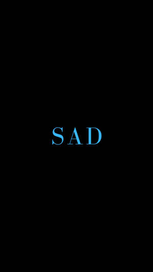 喺黑色背景上發出藍色光芒嘅「SAD」字樣。