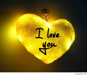 發光心形燈，帶有手寫 I love you 訊息。