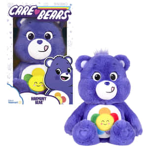 紫色 Harmony Bear 毛公仔帶有彩虹花標誌，旁邊係 Care Bears 盒。