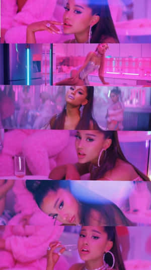 Ariana Grande 在一個有霓虹燈的粉紅色未來感房間裡。