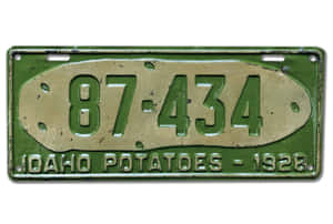 1928年愛達荷州馬鈴薯車牌，帶有綠色銅鏽和編號87-434 — 汽車 壁紙