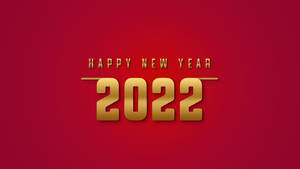 金色文字在紅色背景上寫著 Happy New Year 2022。