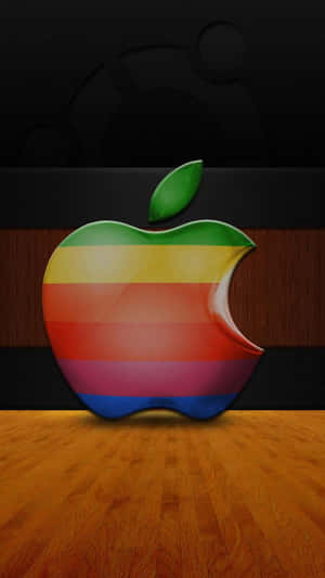 深色背景木地板上的彩虹Apple標誌