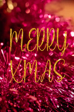 粉紅色閃粉背景上的金色閃粉 Merry Xmas
