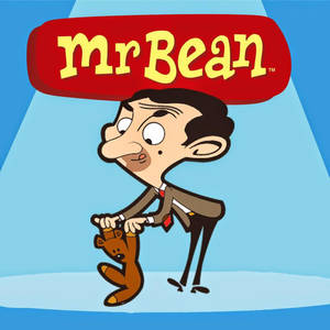 Mr Bean 卡通角色在聚光燈下抱著一隻泰迪熊。