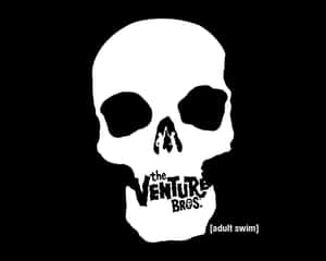 白色骷髏標誌，內部有微小人物和「the Venture Bros」文字，黑色背景。
