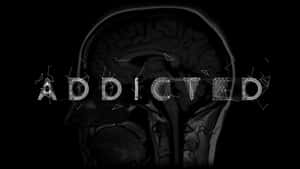 大腦的MRI掃描，帶有線框字母的addicted字樣。 — 暗色 壁紙