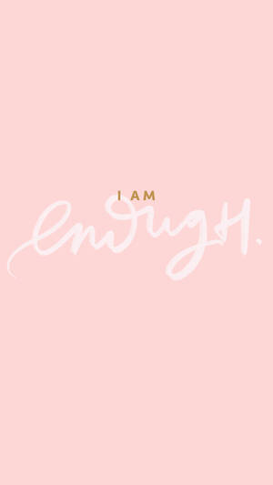 粉紅色背景，白色草書文字寫著「I AM Enough」，上方有金色大寫字母。