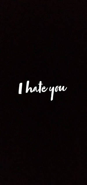 黑色背景上帶有白色手寫文字「I hate you」