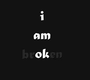 黑色橫線紙張背景上顯示文字「i am broken」
