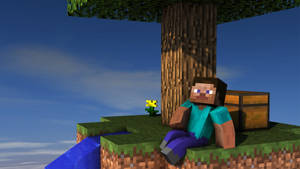 Minecraft角色坐在水邊草崖上的樹下，靠近箱子