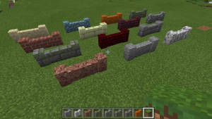 草地上多種顏色和材質的Minecraft圍欄方塊。