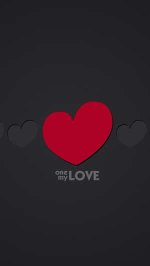 一個紅色心形，帶有模糊的灰色心形和文字 one my LOVE，位於深灰色背景上。