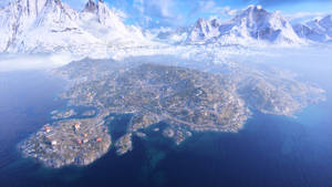 雪覆蓋的山島、沿海小鎮、藍色海洋中的紅色建築。