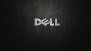 黑色皮革背景上的銀色 Dell 標誌