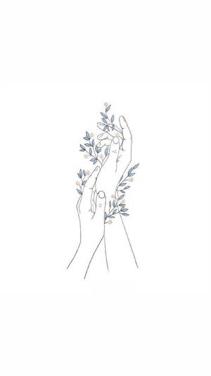 兩隻手拿著一枝帶有藍色葉子和細小花朵的小樹枝。