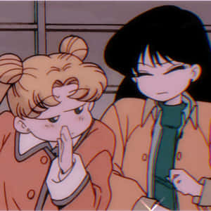 兩個穿著外套的動畫女孩共享一個安靜的情感時刻。