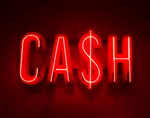 紅色霓虹燈牌，顯示 'CASH'，美元符號取代了 S。