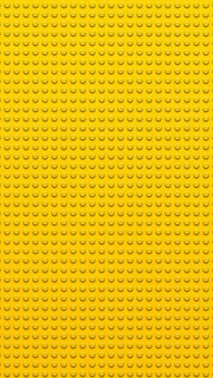 黃色LEGO底板，帶有重複凸點圖案，用於搭建。 — 淺紫色動態圖片 壁紙