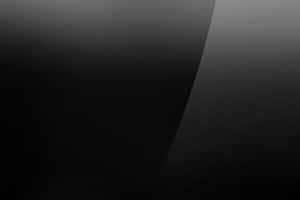帶有對角光線分離效果的極簡抽象黑色和灰色漸變。 — 灰色 GIF 壁紙
