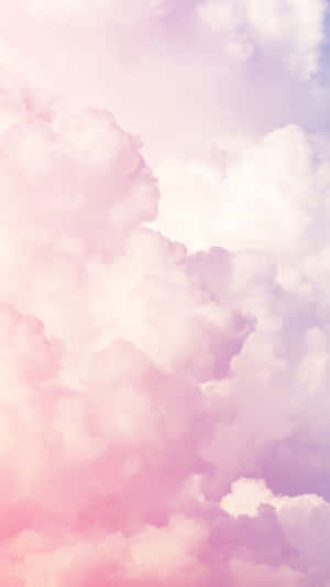 粉紅色同薰衣草色雲朵喺平靜嘅天空飄浮。 — 唯美雲朵動態 壁紙