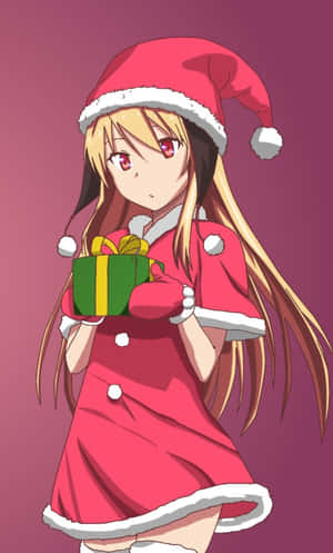 動漫女孩穿著聖誕老人服裝拿著禮物盒。