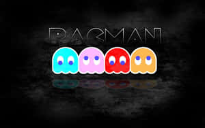 四個色彩繽紛的 Pac-Man 鬼魂在深色背景上排列成一行，上方有 PACMAN 字樣。