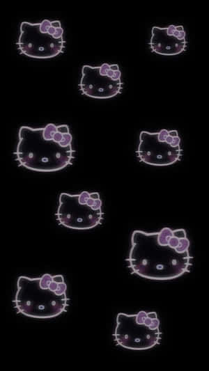 黑色背景上發光的紫色Hello Kitty面孔。
